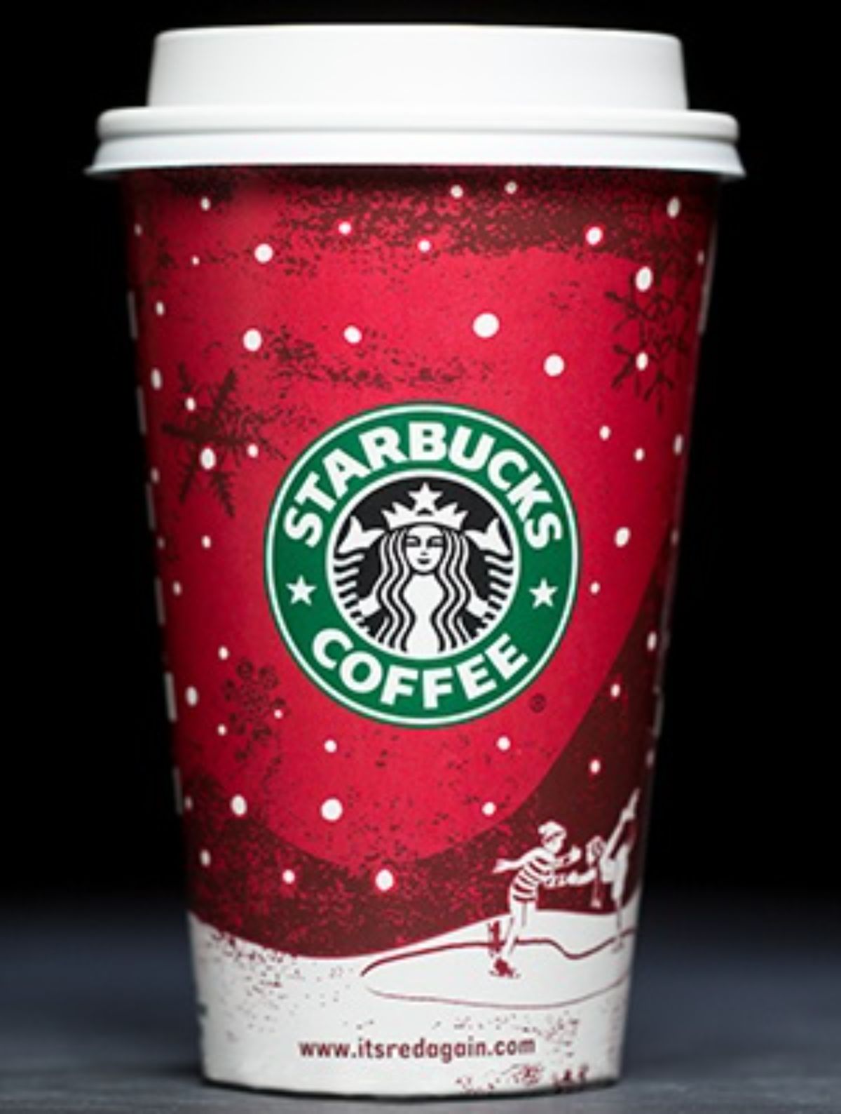 2007 Starbucks Holiday Cup in red with ice skating scene