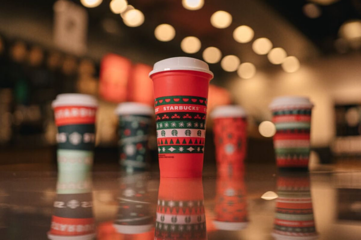 a collection of 2020 starbucks holiday cups
